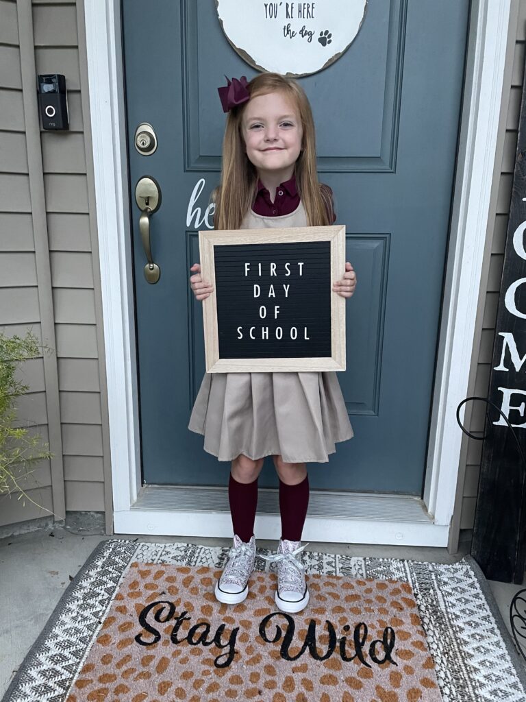 First day of school photo idea, school uniforms